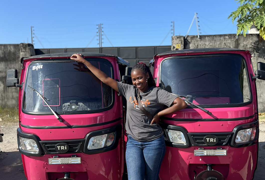 pbi-driver-pose-with-pink-bajaji